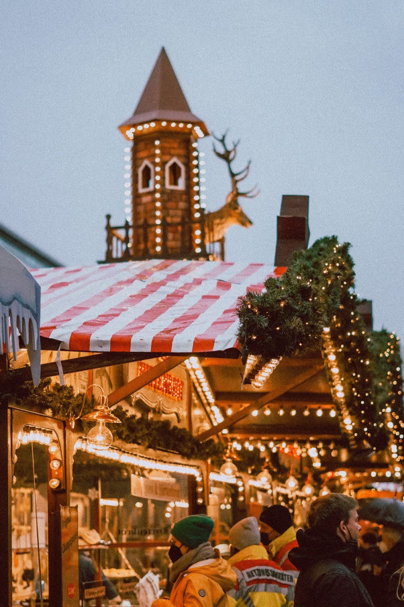 An illuminated Christmas market stall
